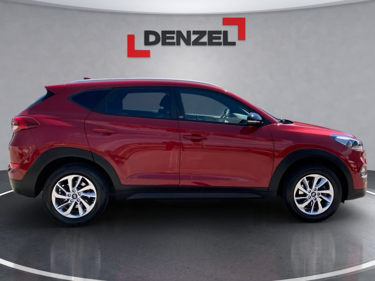 Bild 4: Hyundai Tucson 1,6 GDi GO